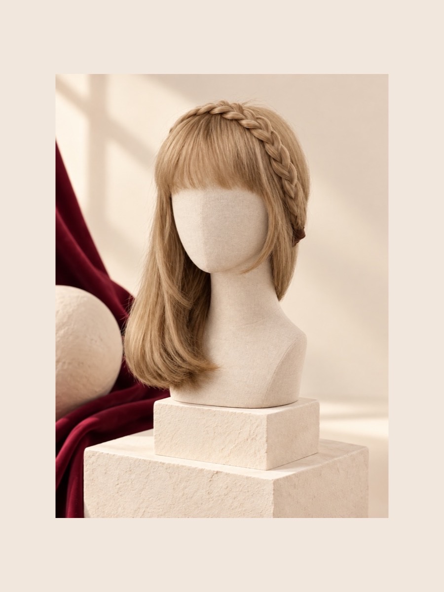 B12 headband / half wig shown on a faceless linen mannequin