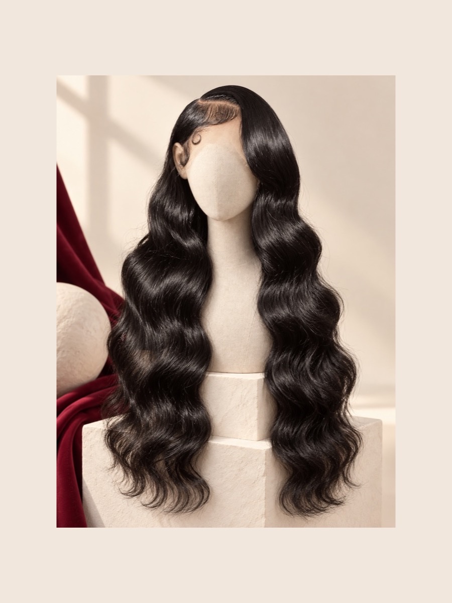 Body Wave human-hair wig shown on a faceless linen mannequin