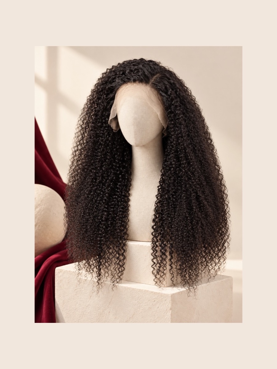Kinky Curly human-hair wig shown on a faceless linen mannequin