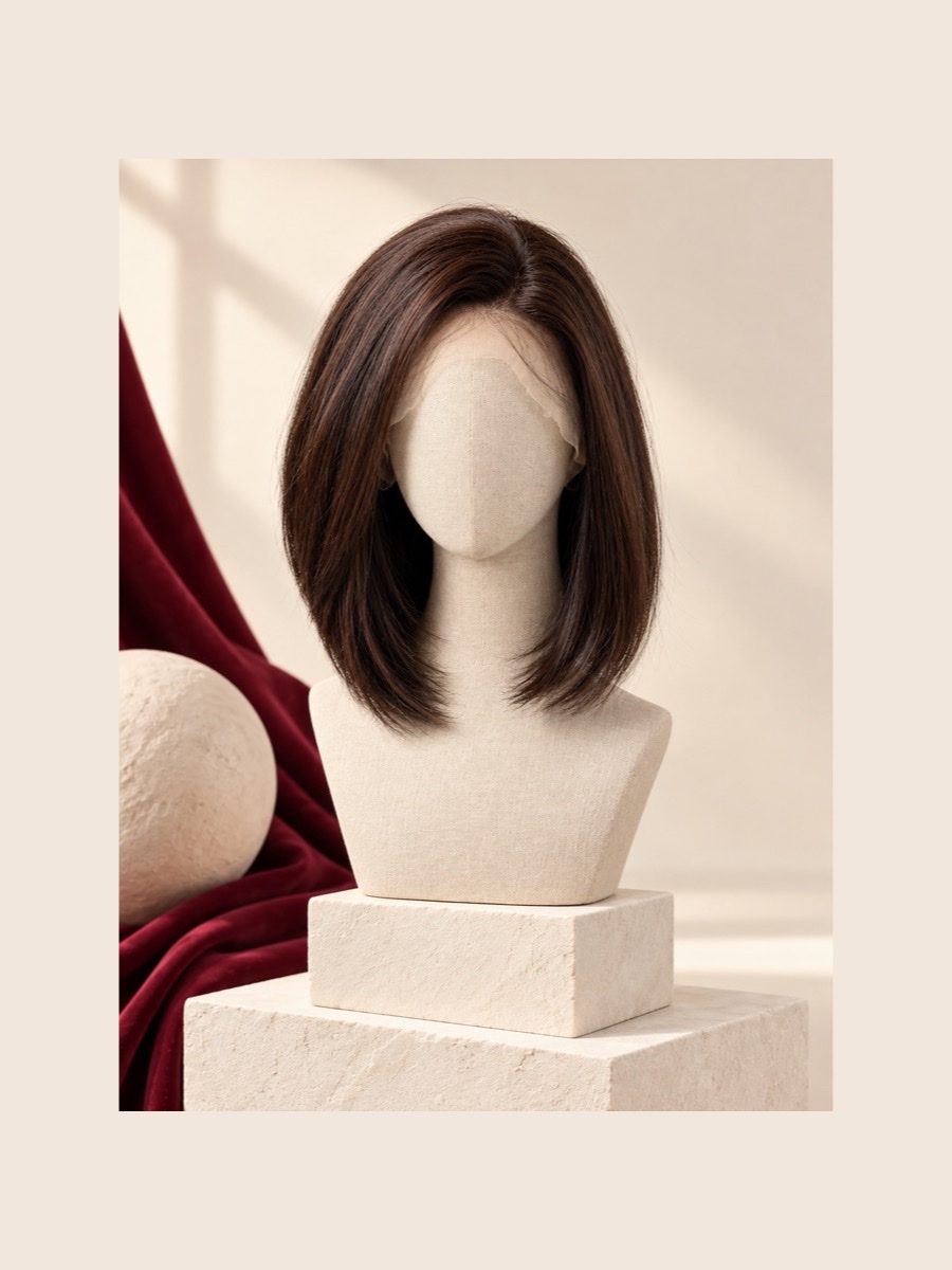 MLW-002&FUDark Chocolate monofilament wig shown on a faceless linen mannequin