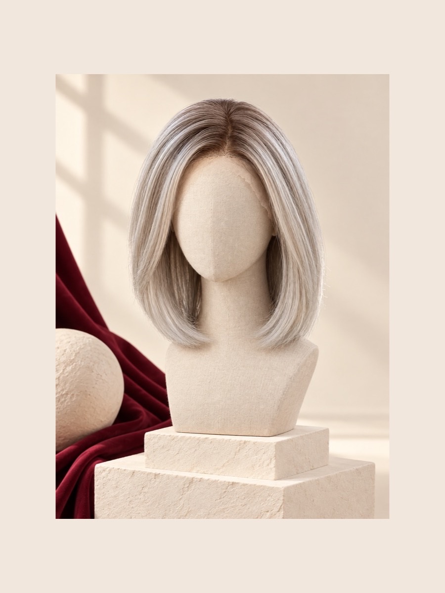 MLW-002 Ivory Grey monofilament wig shown on a faceless linen mannequin